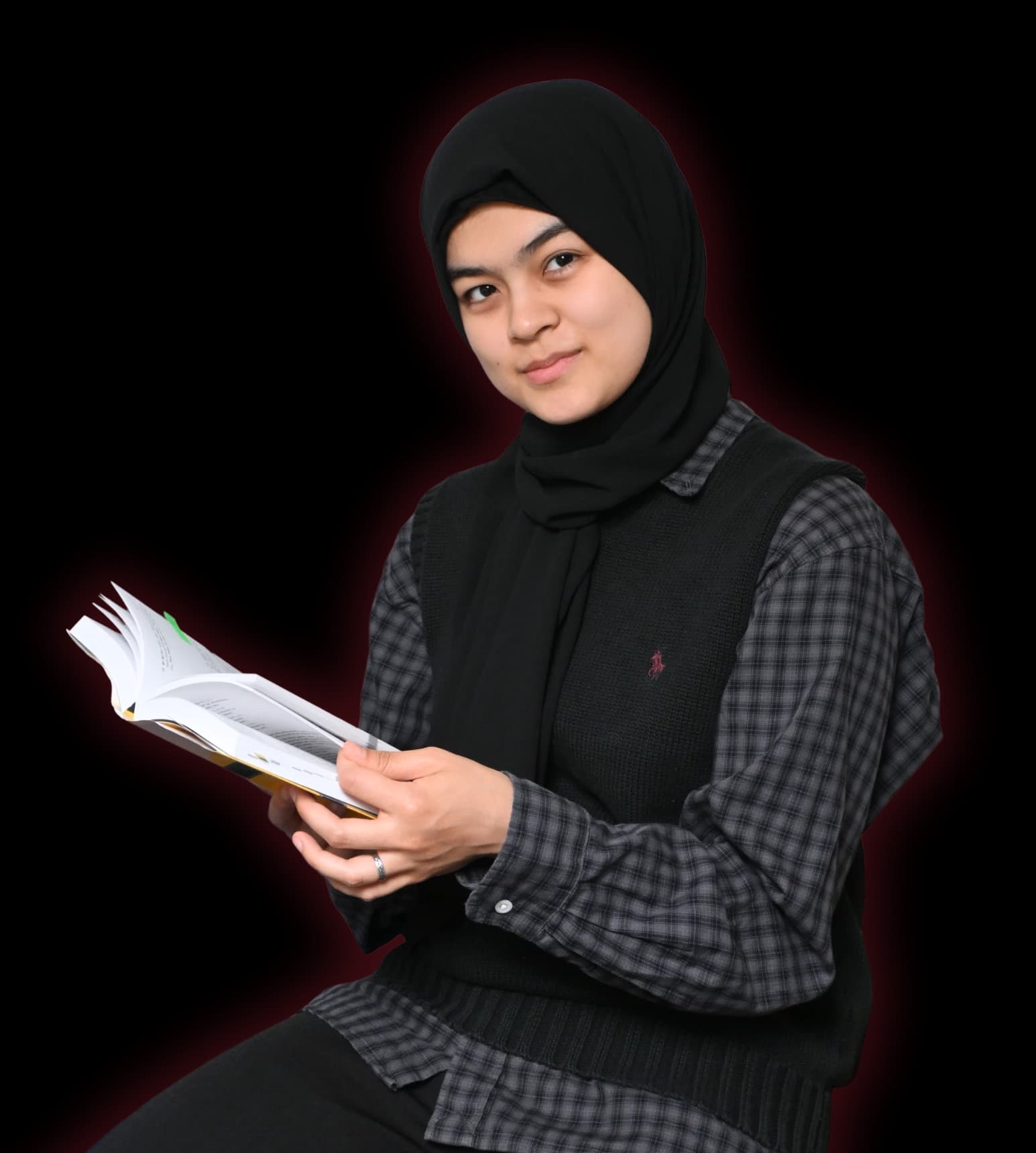 Zubiya sensei smiling and holding a book